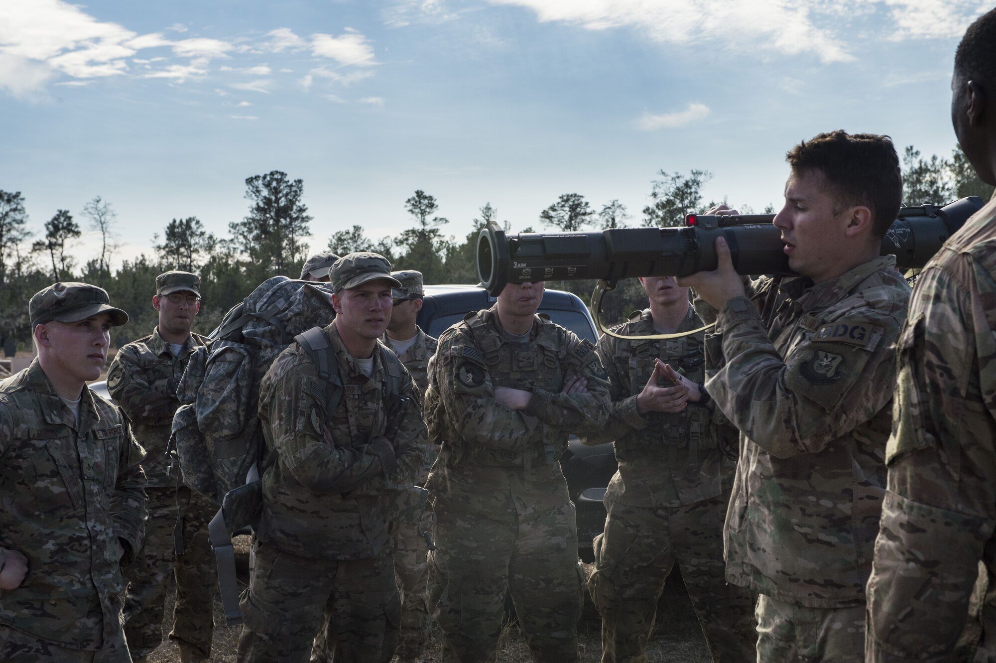 Staff Sgt. Nicholas Diamond, 820th combat operations squadron combat arms training and maintenance instructor, instructs Airmen on the firing procedures for an M136E1 AT4-CS confined space  light anti-armor weapon, Jan. 24, 2018, at Camp Blanding Joint Training Center, Fla. During Weapons Week, Airmen qualify on heavy weapons to include the M2 machine gun, Mark 19 40mm grenade machine gun, M240B machine gun, M249 light machine gun, M136E1 AT4-CS confined space light anti-armor weapon, and M18 Claymore mine. (U.S. Air Force photo by Senior Airman Janiqua P. Robinson)