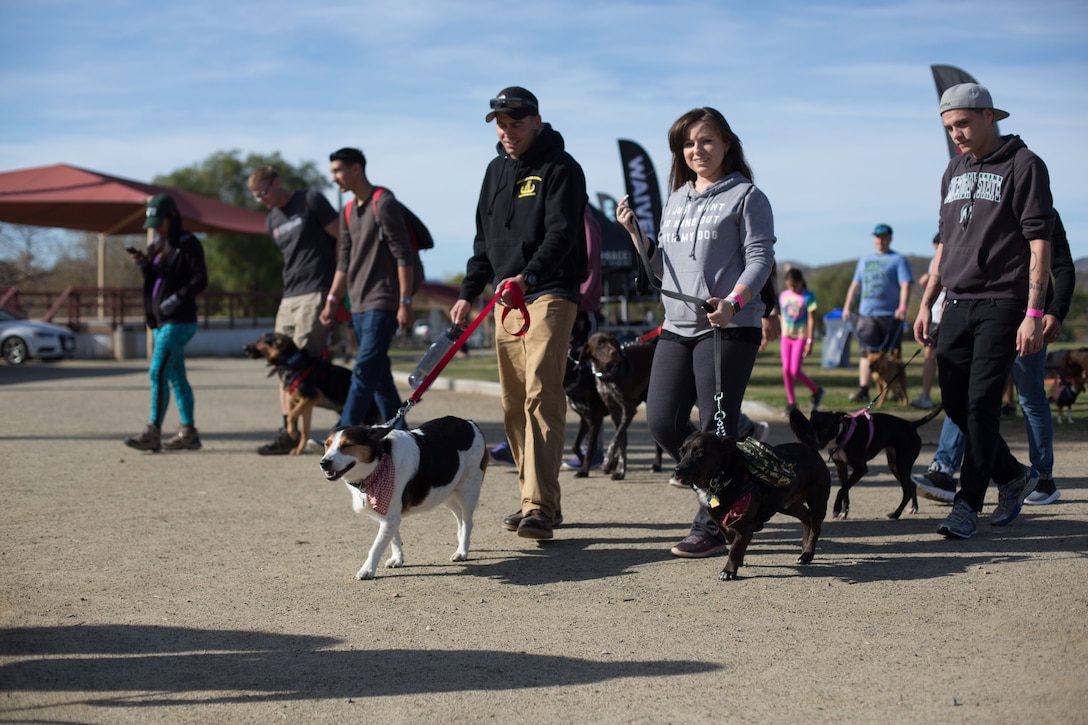 U.S. Marines and family members kick off the Tails and Trails, 4k walk, at Lake O’Neill aboard Camp Pendleton, Calif, Jan. 27, 2018.