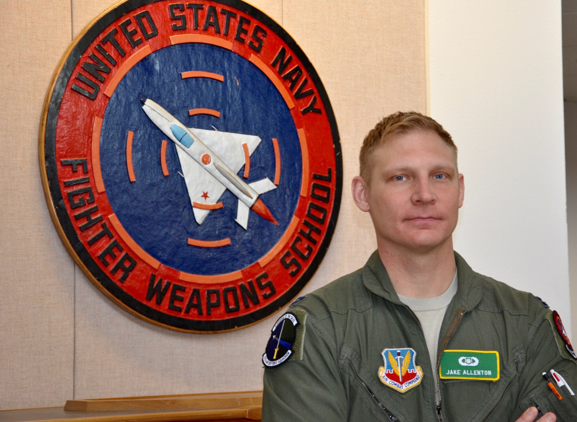 Capt. Jason Allenton, an air battle manager assigned to the 225th Air Defense Squadron, Western Air Defense Sector, is the second ever U.S. Air National Guardsman to graduate from the U.S. Navy Fighter Weapons School (TOPGUN) located at Naval Air Station Fallon, Nevada.  As a TOPGUN graduate, Allenton will share new techniques and best practices with his fellow Airmen and members of the Navy who come to train at the WADS from nearby installations in the Puget Sound.  (Courtesy photo)