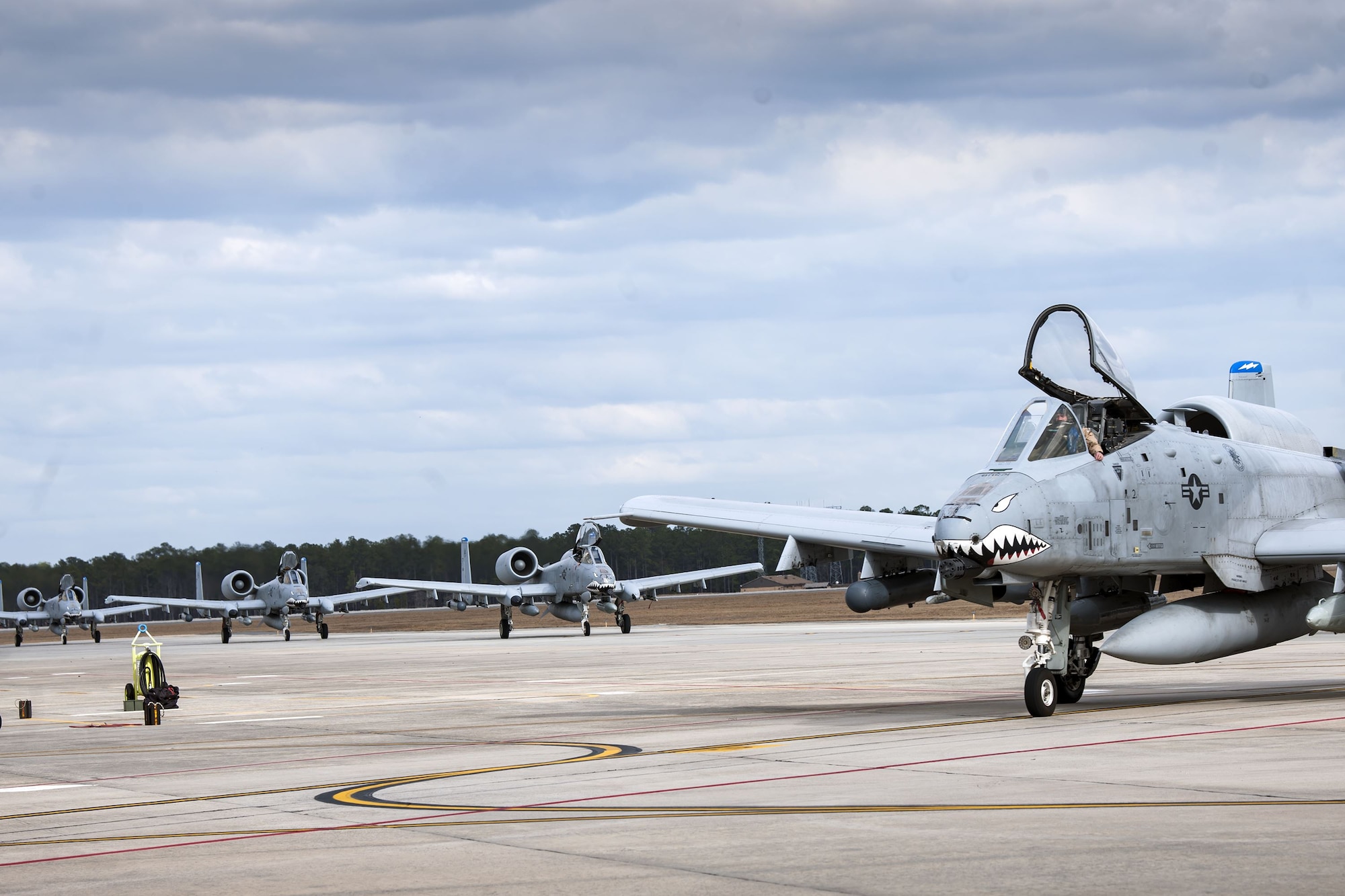 Four A-10C Thunderbolt IIs taxi toward their parking spots after returning from a deployment, Jan. 26, 2018, at Moody Air Force Base, Ga.  During the seven-month deployment the 74th FS flew more than 1,700 sorties, employed weapons more than 4,400 times, destroyed 2,300 targets and killed 2,800 insurgents. (U.S. Air Force photo by Airman Eugene Oliver)