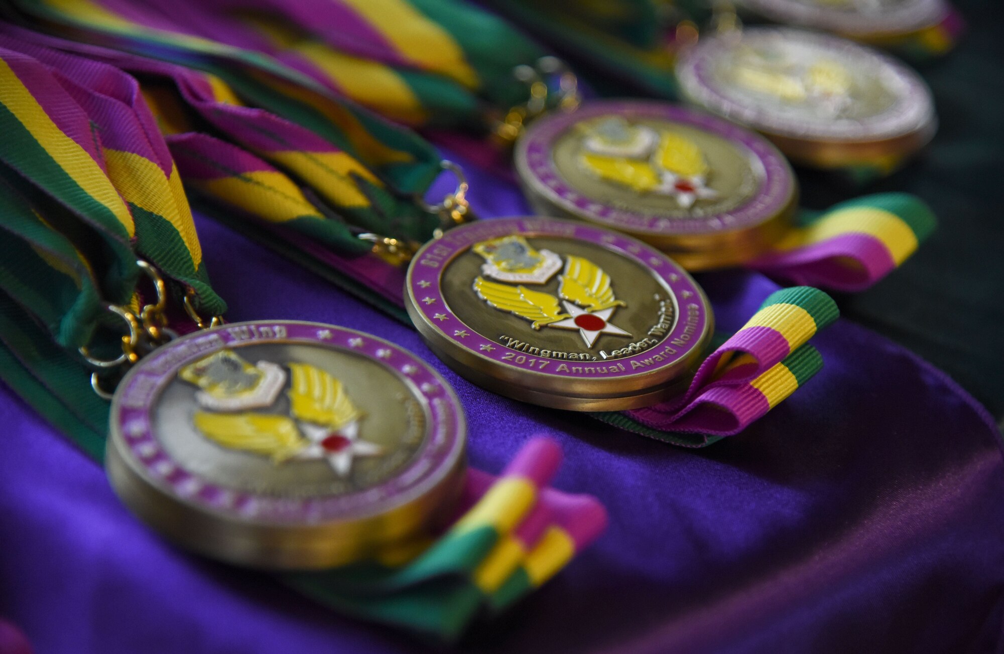 Medals are displayed during the 2017 Keesler Annual Awards Ceremony medallion ceremony at the Bay Breeze Event Center Jan. 25, 2018, on Keesler Air Force Base, Mississippi. During the ceremony base leadership recognized outstanding Airmen and civilians from across the installation for their accomplishments throughout 2017. (U.S. Air Force photo by Kemberly Groue)