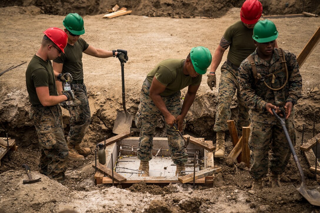 U.S. Marines with Marine Wing Support Squadron 172, 1st Marine Aircraft Wing, work on the construction of a multifunctional building in support of Exercise Cobra Gold 2018 at Ban Pan Mo School in Chanthaburi, Kingdom of Thailand, Jan. 24, 2018. Cobra Gold is in its 37th iteration, and humanitarian civic assistance projects conducted during the exercise support the needs and humanitarian interests of the Thai people. (U.S. Marine Corps photo by Sgt. Matthew J. Bragg)