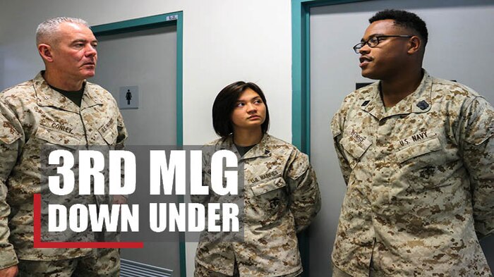 Brig. Gen. Daniel B. Conley, Commanding General, 3rd Marine Logistics Group, checks on the morale and welfare of Cpl. Anthonette Bement and Hospitalman Michael George during a visit to Darwin, Australia Jan. 28, 2018. Conley was conducting a site survey of the Ground Equipment Support Program at various bases in Darwin in preparation for the Marine Rotational Force - Darwin scheduled to begin in March. The presence of U.S. Marines in Australia reflects the enduring alliance and common security interests in the region and improves interoperability between the two nations. Bement is a Lorain, Ohio native and is the embarkation chief with the GESP forward deployed from Combat Logistics Regiment 35, 3rd Marine Logistics Group. George is a San Antonio native, also forward deployed from CLR-35. (U.S. Marine Corps photo by Staff Sgt. Valerie Eppler)