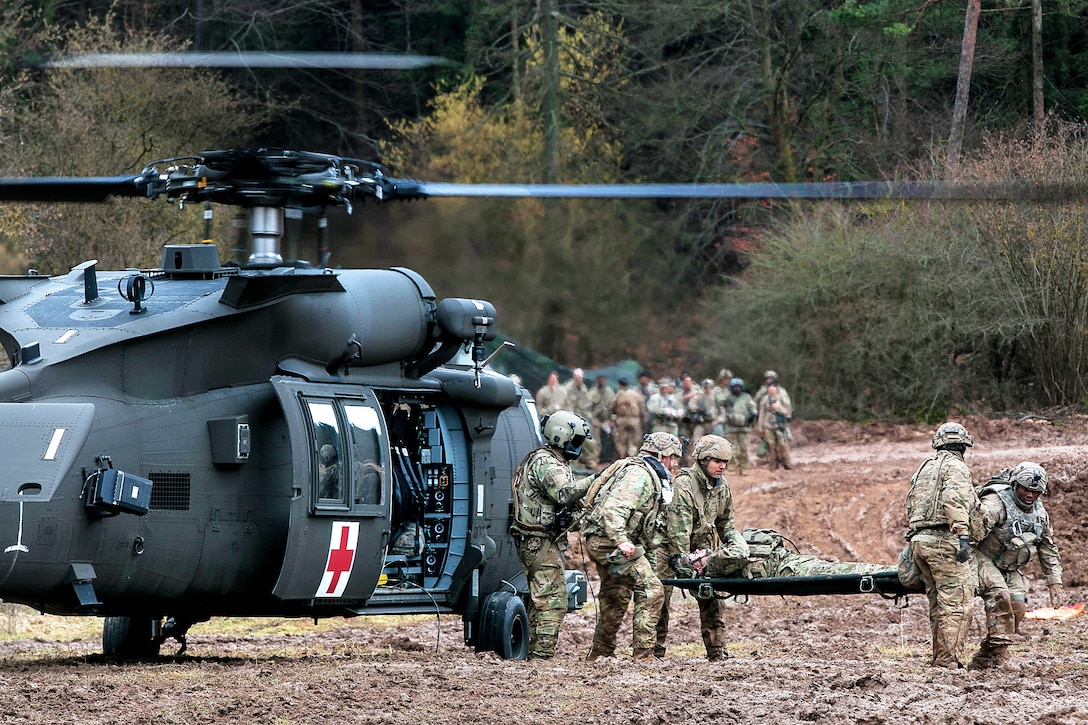 Soldiers conduct rapid medical evacuation training.
