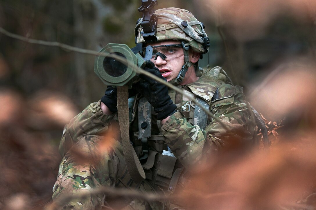 Army Spc. Jacob Peters prepares to fire an AT-4 anti-armor weapon at opposing forces.
