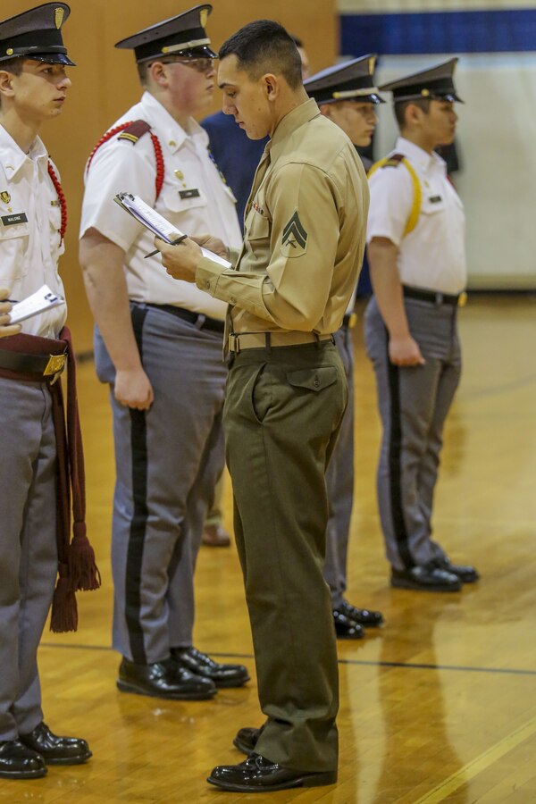 Members of the Silent Drill Platoon judged the 15th iteration of the Northern Virginia Region's JROTC drill competition, hosted at Liberty high school; Bealeton, Va. Marines supported the event as drill judges, which provided the junior reserve officers an opportunity to observe the mannerisms and standards of currently serving SDP Marines at Marine Barracks Washington. (Official Marine Corps photo by Cpl. Damon A. Mclean/Released)