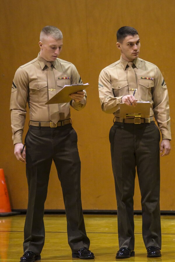 Members of the Silent Drill Platoon judged the 15th iteration of the Northern Virginia Region's JROTC drill competition, hosted at Liberty high school; Bealeton, Va. Marines supported the event as drill judges, which provided the junior reserve officers an opportunity to observe the mannerisms and standards of currently serving SDP Marines at Marine Barracks Washington. (Official Marine Corps photo by Cpl. Damon A. Mclean/Released)