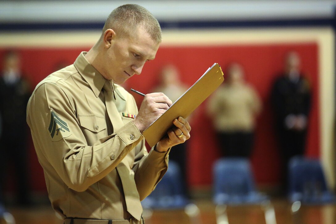 Members of the Silent Drill Platoon judged the 15th iteration of the Northern Virginia Region's JROTC drill competition, hosted at Liberty high school; Bealeton, Va. Marines supported the event as drill judges, which provided the junior reserve officers an opportunity to observe the mannerisms and standards of currently serving SDP Marines at Marine Barracks Washington. (Official Marine Corps photo by Cpl. Damon A. Mclean/Released)