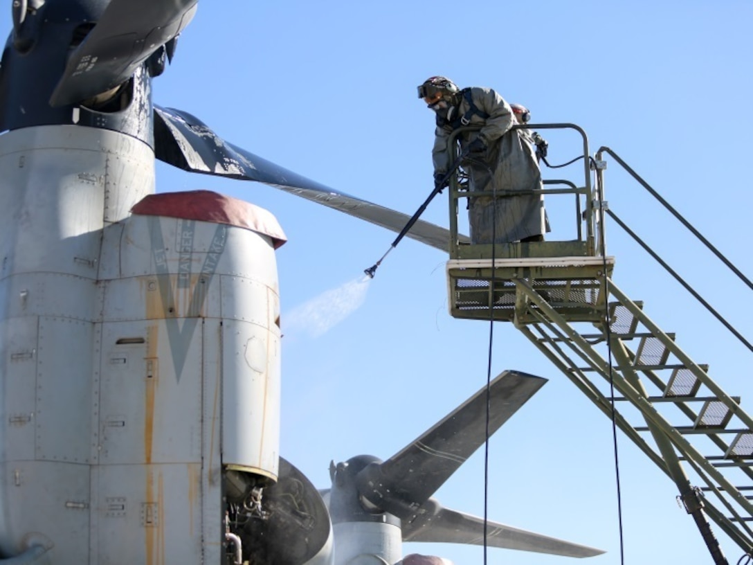 Marines with Marine Light Attack Helicopter Squadron (HMLA) 267 and Marine Aircraft Group (MAG) 39 chemical, biological, radiological and nuclear (CBRN) prepare for detailed aircraft decontamination training at Marine Corps Air Ground Combat Center, Twentynine Palms, Calif., Jan. 25. HMLA-267 Marines learned the five station, five-stage process and will now serve as subject matter experts on aircraft decontamination for their respective unit’s aircraft.