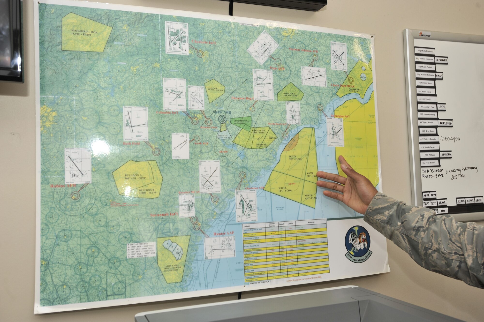 U.S. Air Force Staff Sgt. Maxime Estimable, 20th Operations Support Squadron weather flight weather forecaster, explains which airspaces the weather flight is responsible for when tracking the weather at Shaw Air Force Base, S.C., Jan. 26, 2018.