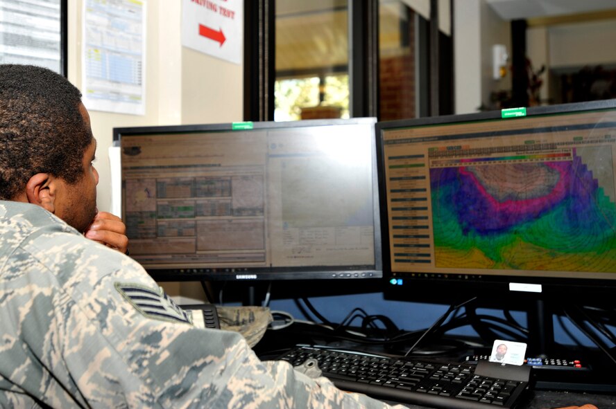 U.S. Air Force Staff Sgt. Maxime Estimable, 20th Operations Support Squadron weather flight weather forecaster, observes an hourly weather projection at Shaw Air Force Base, S.C., Jan. 26, 2018.