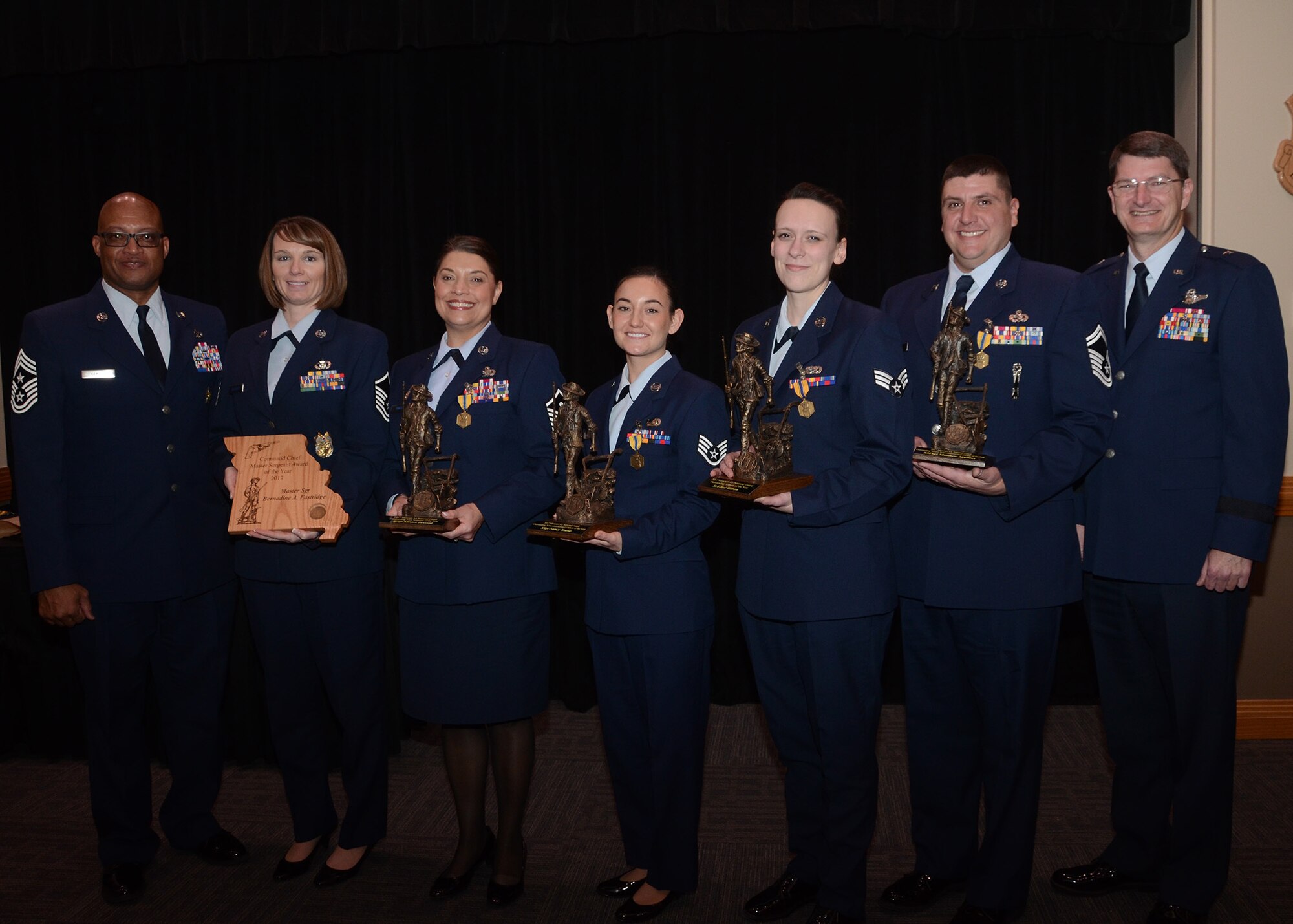 The Missouri Air National Guard 2017 Outstanding Airmen of the year are joined by Brig. Gen. Michael Francis, Missouri assistant adjutant general - Air, and Chief Master Sgt. Joseph Hamlett, the Missouri Air National Guard command chief. Pictured from left to right: Hamlett, Master Sgt. Bernadine Eastridge, (Missouri Air National Guard Command Chief Award winner) 139th Airlift Wing, Master Sgt. Kirsten Inwood, (First Sergeant of the Year) 131st Bomb Wing, Staff Sgt. Nanci Young, (NCO of the Year) 139th AW, Senior Airman Jael Watson, (Airman of the Year) 131st BW, Senior Master Sgt. Matthew Mullins, (Senior NCO of the Year) 139th AW, and Francis.