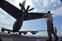 Crew chiefs from Tinker Air Force Base, Okla., Senior Airman Samuel Bryant, 507th Maintenance Squadron, and Tech. Sgt. Justin Nichols, 507th Aircraft Maintenance Squadron, prepare a KC-135 Stratotanker for flight Jan. 19, 2018, at Kona International Airport, Hawaii. 507th Air Refueling Wing air and maintenance crews flew the KC-135 to Hawaii in direct support of Exercise Sentry Aloha. (U.S. Air Force photo/Tech. Sgt. Samantha Mathison)