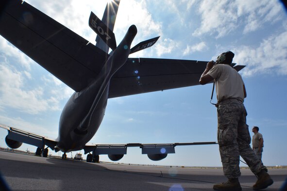 Crew chiefs from Tinker Air Force Base, Okla., Senior Airman Samuel Bryant, 507th Maintenance Squadron, and Tech. Sgt. Justin Nichols, 507th Aircraft Maintenance Squadron, prepare a KC-135 Stratotanker for flight Jan. 19, 2018, at Kona International Airport, Hawaii. 507th Air Refueling Wing air and maintenance crews flew the KC-135 to Hawaii in direct support of Exercise Sentry Aloha. (U.S. Air Force photo/Tech. Sgt. Samantha Mathison)