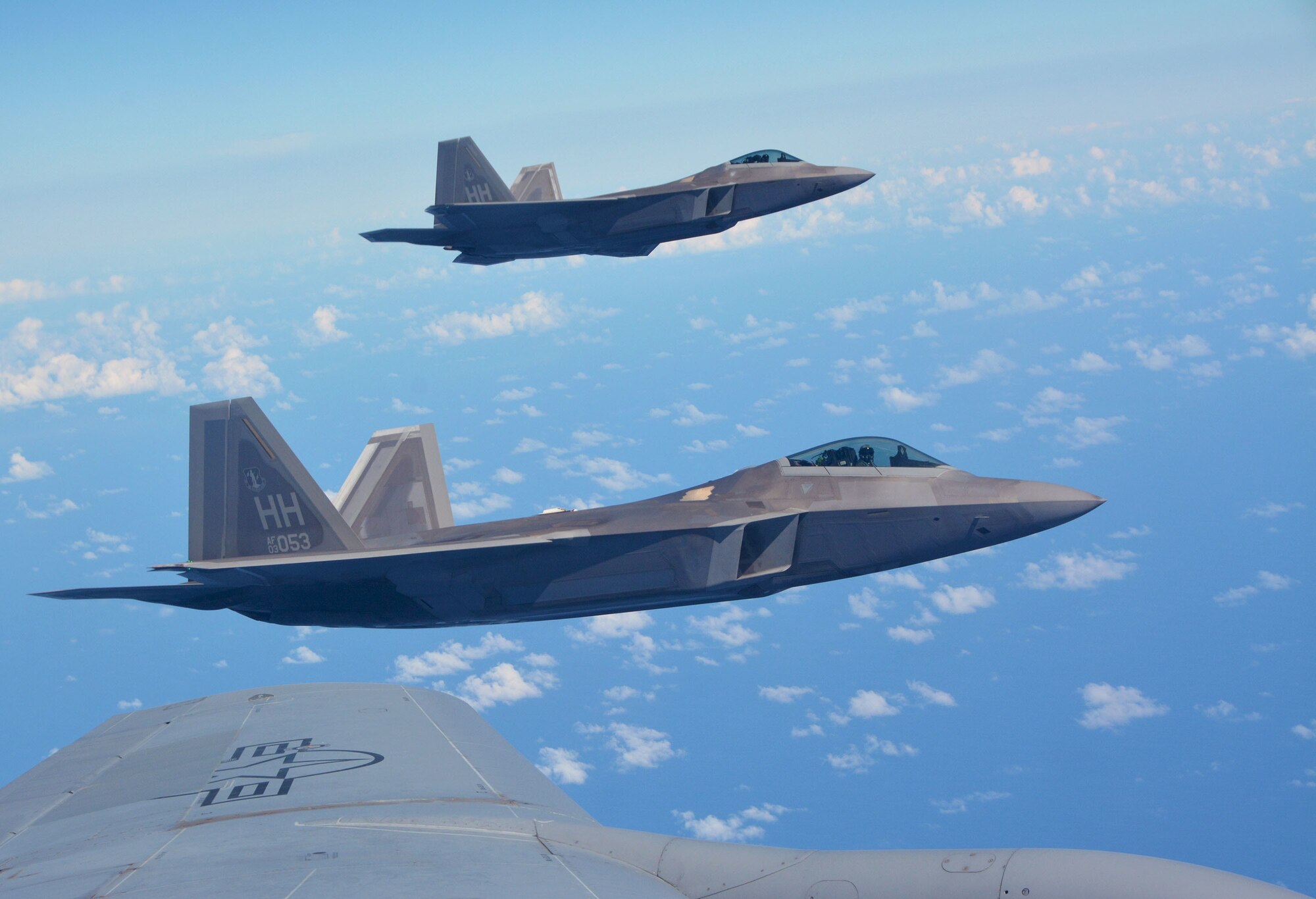 Two 154th Wing Hawaii National Guard F-22 Raptors from Joint Base Pearl Harbor-Hickam, Hawaii, fly alongside a 507th Air Refueling Wing KC-135R Stratotanker from Tinker Air Force Base, Okla., Jan. 22, 2018, in support of Exercise Sentry Aloha in Hawaii. (U.S. Air Force photo/Tech. Sgt. Samantha Mathison)