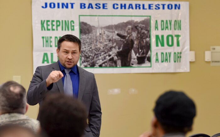 Retired Chief Master Sgt. Chad Ballance, speaks during a Martin Luther King Jr. Observance event at the Air Base Chapel Jan. 29, 2018.