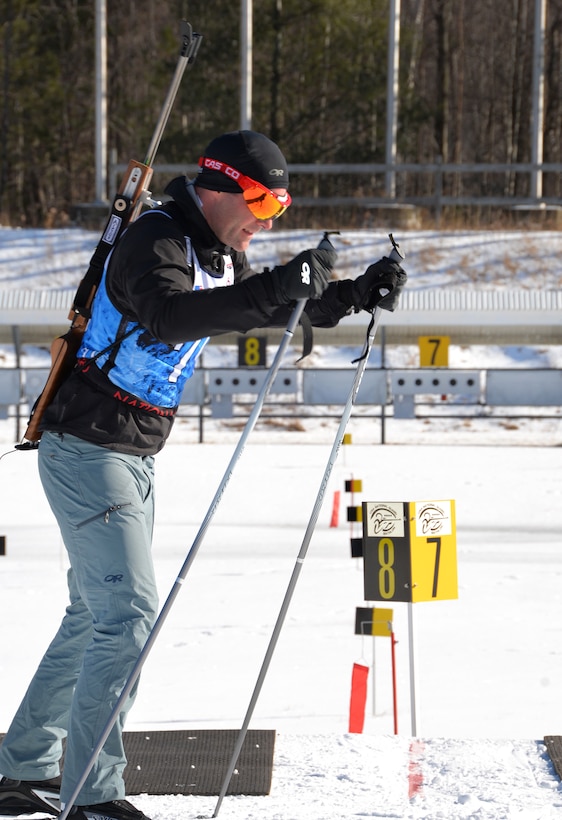 New York Army National Guard Capt. Joseph Moryl skis to his firing position.