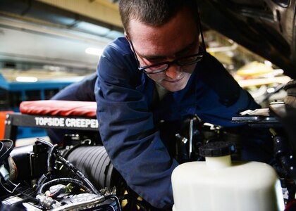 Airman 1st Class Jeremiah Wilson, mission general vehicle equipment maintenance apprentice with the 673d Logistics Readiness Squadron Vehicle Maintenance, General Purpose shop, extracts a valve cover bolt from a diesel engine, Jan. 25, 2018, at Joint Base Elmendorf-Richardson, Alaska. The General Purpose shop repairs and services bobtails, busses, forklifts, Humvees and Wollard MB-4’s.