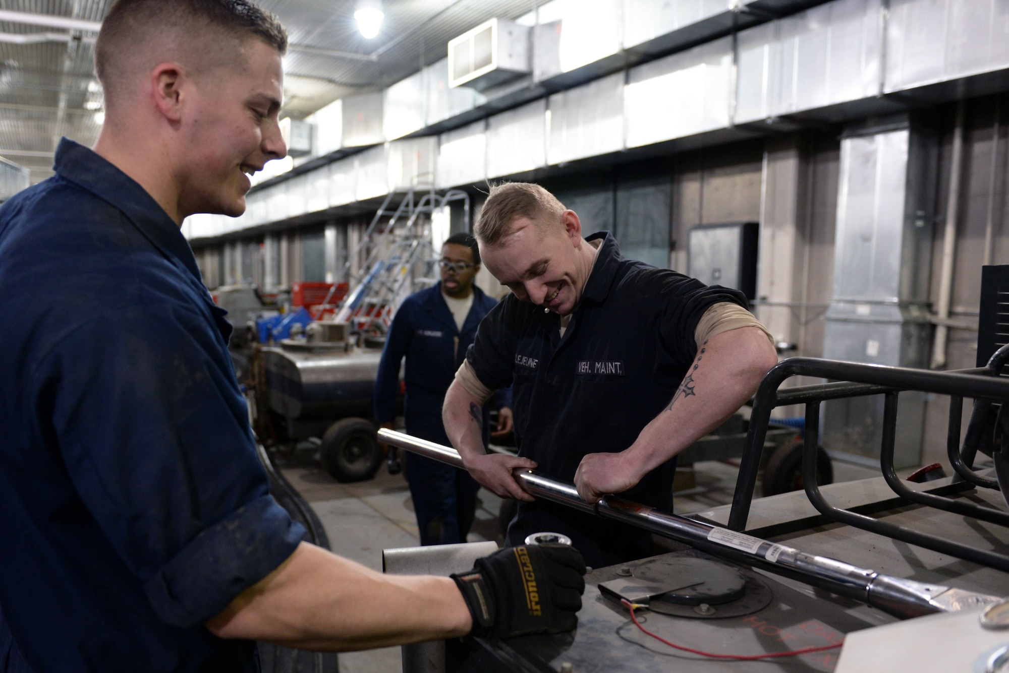 Senior Airman Blade LeJeune and Senior Airman Samuel Unke, mission general vehicle equipment maintenance journeymen with the 673d Logistics Readiness Squadron Vehicle Maintenance, Refueling Maintenance shop, assemble a heavy-duty torque wrench, Jan. 26, 2018, at Joint Base Elmendorf-Richardson, Alaska. The Refueling Maintenance shop repairs and services all refueling equipment such as the R-11 and R-12 at JBER.