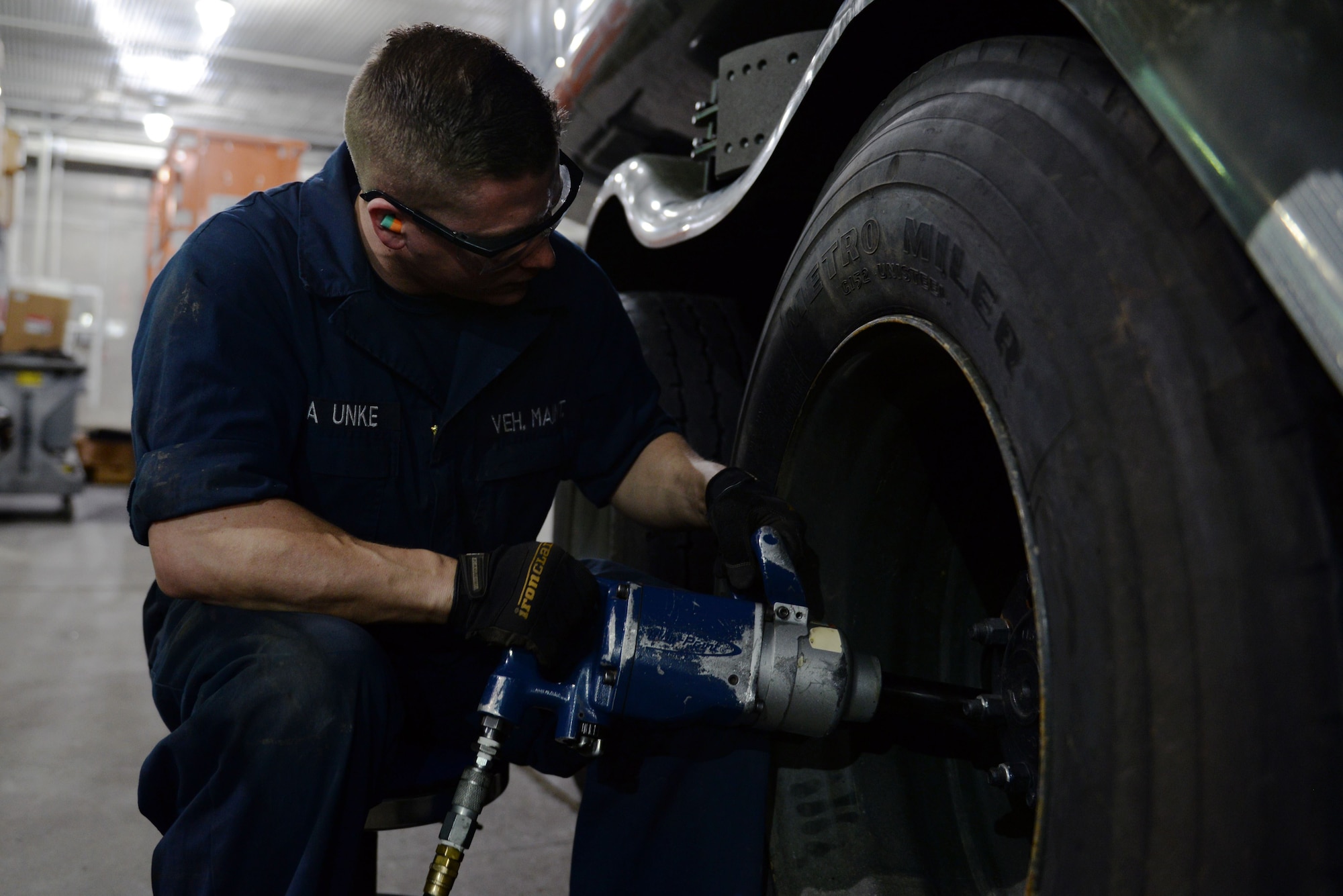 Senior Airman Samuel Unke, a mission general vehicle equipment maintenance journeymen with the 673d Logistics Readiness Squadron Vehicle Maintenance, Refueling Maintenance shop, torques the lug nuts on an R-11 after a tire replacement, Jan. 26, 2018, at Joint Base Elmendorf-Richardson, Alaska. The Refueling Maintenance shop repairs and services all refueling equipment such as the R-11 and R-12 at JBER.