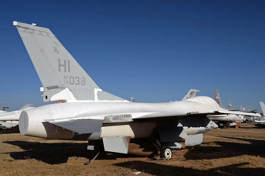 An F-16 Fighting Falcon, tail no. 78-0038, one of the oldest remaining F-16A aircraft and still wearing markings from its time with the Diamondbacks of the 419th Fighter Wing, sits in the 309th Aerospace Maintenance and Regeneration Group open-air storage yard, Davis-Monthan Air Force Base, Arizona, on June 7, 2016. Retired F-16s are stored here for an indefinite time and are often used for spare parts, regenerated for foriegn military sales, or put back into flying status and used as QF-16 full-scale aerial targets. (U.S. Air Force photo by Alex R. Lloyd)