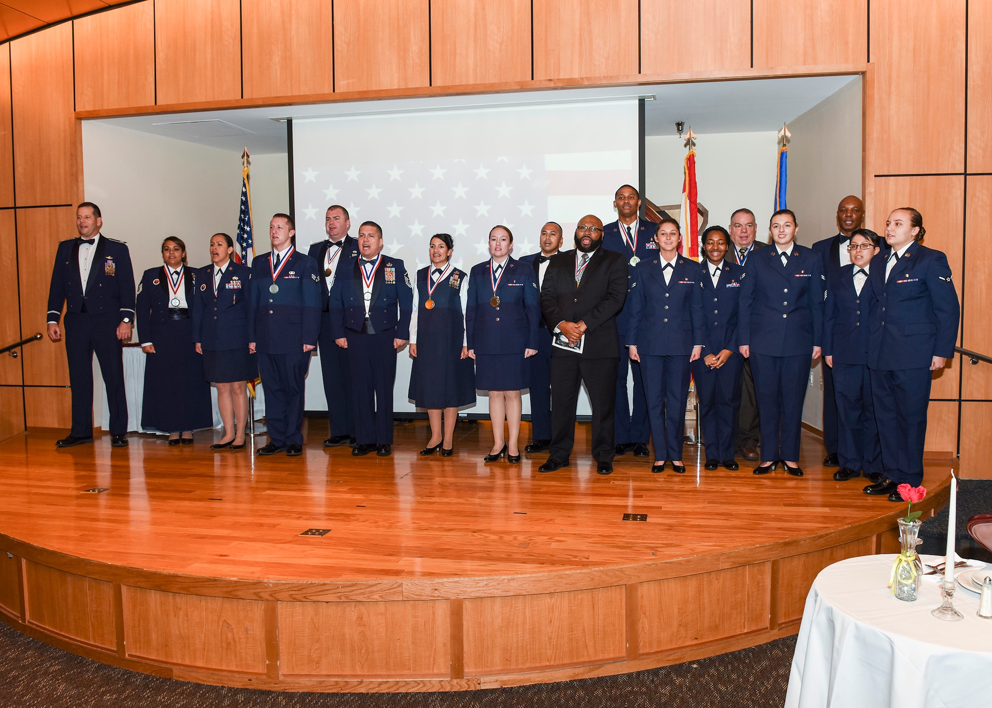 Annual Award winners from Tyndall Air Force Base, Fla., sing the Air Force song at the conclusion of the Annual Award ceremony Jan. 26, 2018 at the Horizons Community Center.