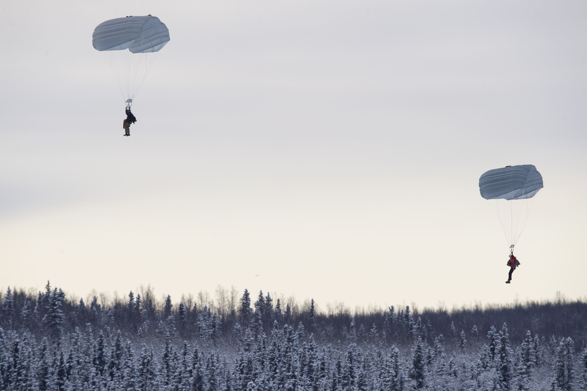 Alaska Air National Guard Rescue Squadrons conduct precision parachute training at JBER