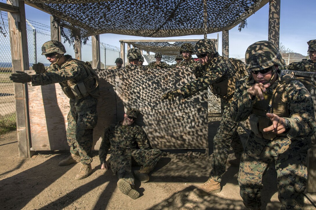 Marines practice room clearing techniques.