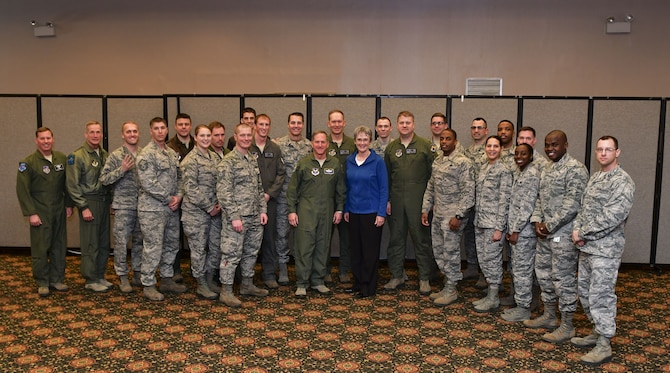 Secretary of the Air Force Heather Wilson and Air Force Chief of Staff Gen. David L. Goldfein pose for a group photo with Airmen and senior leadership from the 8th Fighter Wing at Osan Air Base, Republic of Korea, January 29, 2018. Members of the Wolf Pack were recognized as superior performers by Wilson and Goldfein and briefed the senior leaders on the specific mission sets in their respective fields. (U.S. Air Force photo by Staff Sgt. Franklin R. Ramos)