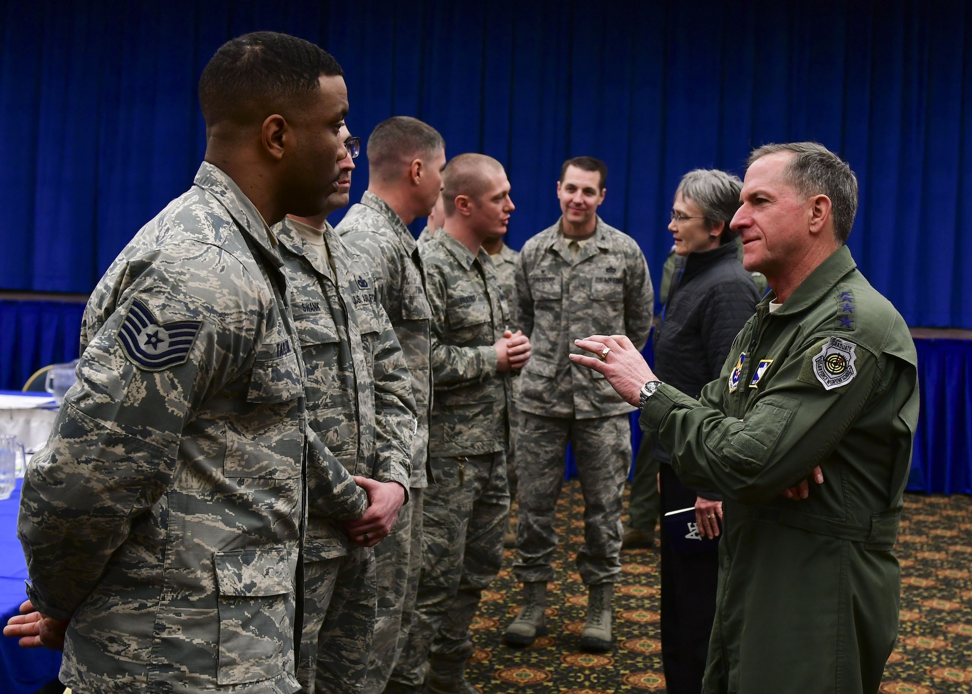 Secretary of the Air Force Heather Wilson and Air Force Chief of Staff Gen. David L. Goldfein speak with Airmen from the 8th Fighter Wing at Osan Air Base, Republic of Korea, January 29, 2018. Members of the Wolf Pack were recognized as superior performers by Wilson and Goldfein and briefed the senior leaders on the specific mission sets in their respective fields. (U.S. Air Force photo by Staff Sgt. Franklin R. Ramos)