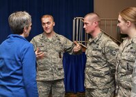 Lt. Col. Matthew "Devil" Altman, 8th Civil Engineering Squadron, speaks to the accomplishments of his troop, Tech. Sgt. Adam Frazier, with Secretary of the Air Force Heather Wilson at Osan Air Base, Republic of Korea, January 29, 2018. Members of the Wolf Pack were recognized as superior performers by Wilson and Goldfein and briefed the senior leaders on the specific mission sets in their respective fields. (U.S. Air Force photo by Staff Sgt. Franklin R. Ramos)
