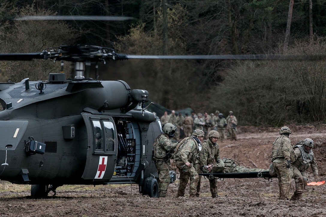 Army medics from the 557th Medical Company conduct rapid medical evacuation training during exercise Allied Spirit VIII at the Joint Multinational Readiness Center in Hohenfels, Germany, Jan. 29, 2018. Army photo by Spc. Dustin D. Biven