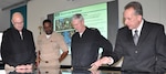 IMAGE: DAHLGREN, Va. (Jan. 16, 2018) – Naval Surface Warfare Center Dahlgren Division (NSWCDD) Innovation Lab (iLab) Director of Innovation Nelson Mills briefs the Commander of Naval Sea Systems Command (NAVSEA) Vice Adm. Thomas Moore, NAVSEA Command Master Chief Robert Crossno, and NSWCDD Commanding Officer Capt. Gus Weekes, on the use of digital collaboration tables as visual aids for surface ships. The collaboration table could provide capabilities to view ship doctrine, navigation tracks, radar information, and Automatic Identification System information for situational awareness. The iLab – equipped with state-of-the-art equipment, services, and trained personnel – opened for business last summer as an intensive collaborative environment where the command's experts work to speed up and maximize corporate innovative solutions across the laboratory. 

The iLab was one stop in the admiral's tour of Dahlgren, which gave him an opportunity to meet with the command's leaders, scientists, and engineers. It was the first in a series of scheduled visits to the NAVSEA Warfare Center divisions under the theme of “Warfare Centers – The Campaign Plan in Action.” While at the iLab, Weekes briefed the NAVSEA commander on Dahlgren technical programs, including directed energy, electromagnetic railgun, chemical, biological, and radiological defense, as well as leadership development. Moore's Campaign Plan is focused on three mission priorities: on-time delivery of ships and submarines, culture of affordability, and cybersecurity. These priorities address today's challenges and provide the focus to achieve NAVSEA's mission and support the Fleet.