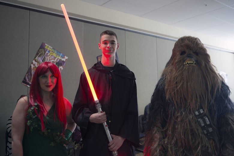 The three winners of the adult costume contest is Chewbacca, Poison Ivy, and a Sith Lord at the Joint Base Elmendorf-Richardson Library 4th Annual Comic Con, Jan. 27, 2018. The event included cosplay, a trivia contest, arts and crafts, and many more activities.