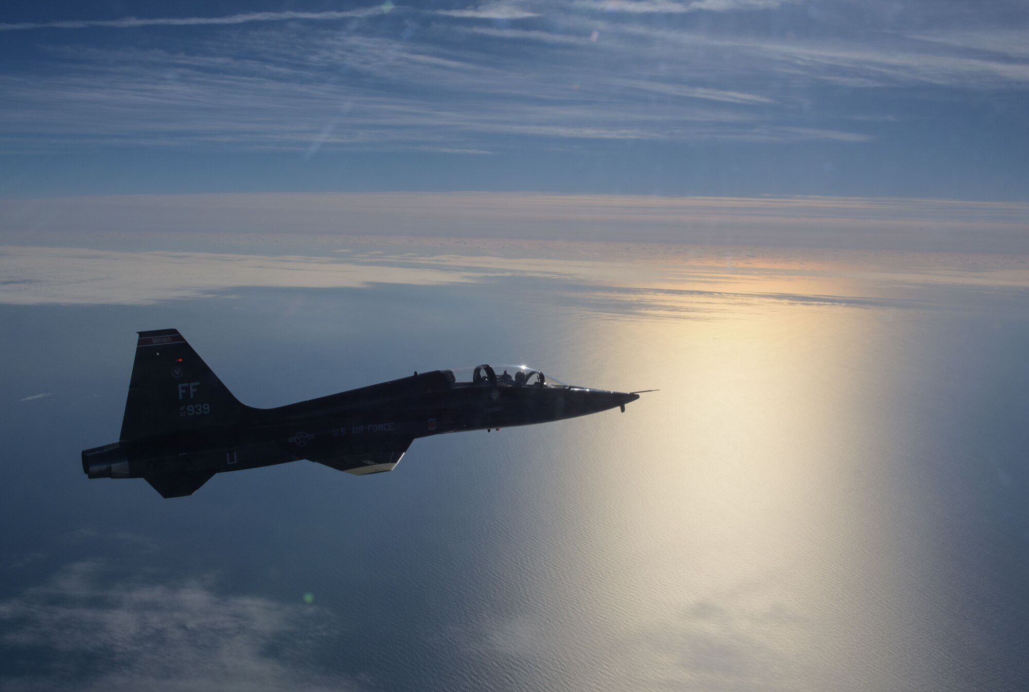 A pilot assigned to the 71st Fighter Training Squadron flies a T-38 Talon over the Atlantic Ocean, Jan. 24, 2018. The T-38 Talon is a twin-engine, high-altitude supersonic pilot trainer aircraft. As the world's first supersonic trainer, the T-38 first flew in 1959 and continues to be used to this day. (U.S. Air Force Photo by Staff Sgt. Carlin Leslie)