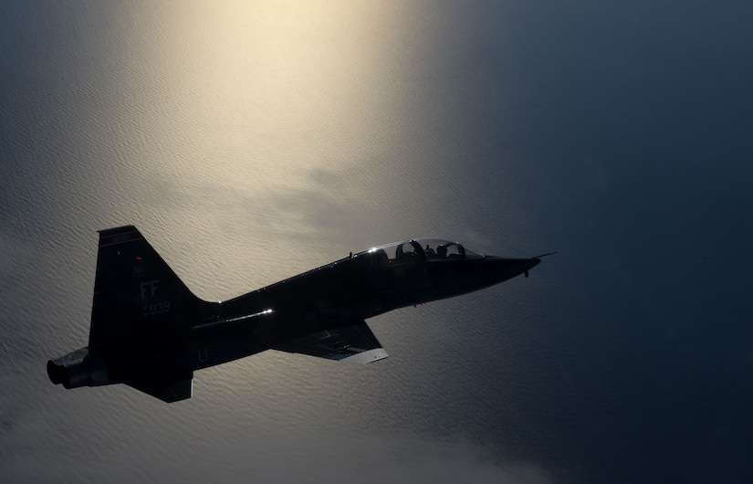 A pilot assigned to the 71st Fighter Training Squadron flies a T-38 Talon over the Atlantic Ocean, Jan. 24, 2018. The T-38 Talon is a twin-engine, high-altitude supersonic pilot trainer aircraft. (U.S. Air Force Photo by Staff Sgt. Carlin Leslie)