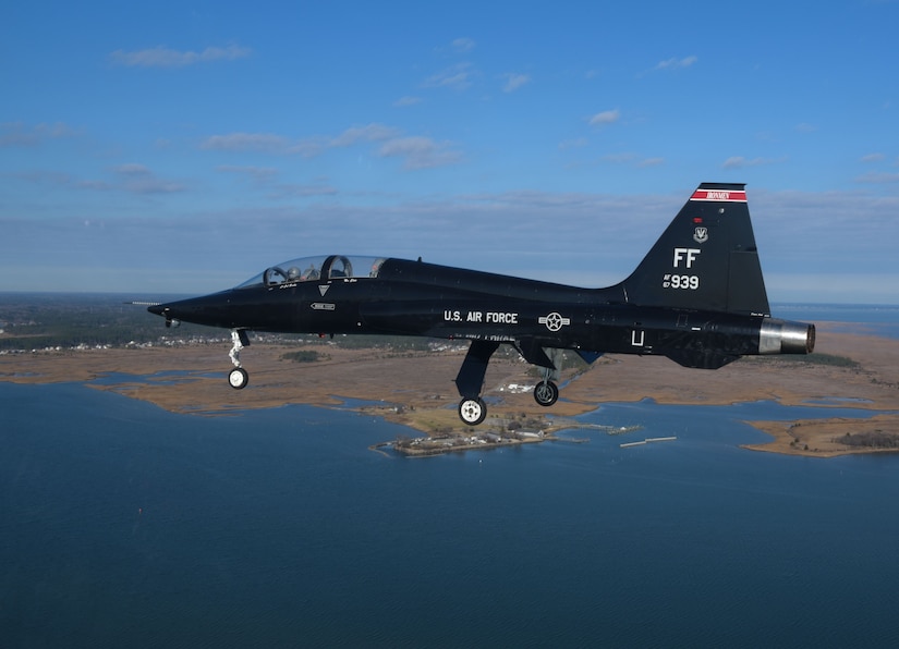 A pilot assigned to the 71st Fighter Training Squadron prepares to do a low pass in a T-38 Talon over the Atlantic Ocean, Jan. 24, 2018. The two-seat jet has a top speed of 858 miles per hour. As the world's first supersonic trainer, the T-38 first flew in 1959 and continues to be used to this day. (U.S. Air Force Photo by Staff Sgt. Carlin Leslie)