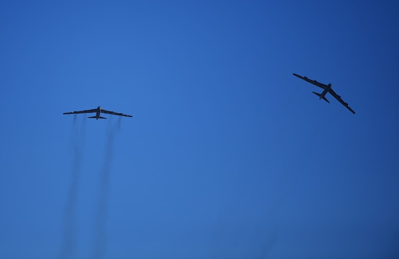 Two B-52H Stratofortresses fly over Minot Air Force Base, N.D., Jan. 30, 2018. The aircraft returned from a deployment to the United Kingdom, where they conducted theater integration and flying training operations. (U.S. Air Force photo by Tech. Sgt. Jarad A. Denton)