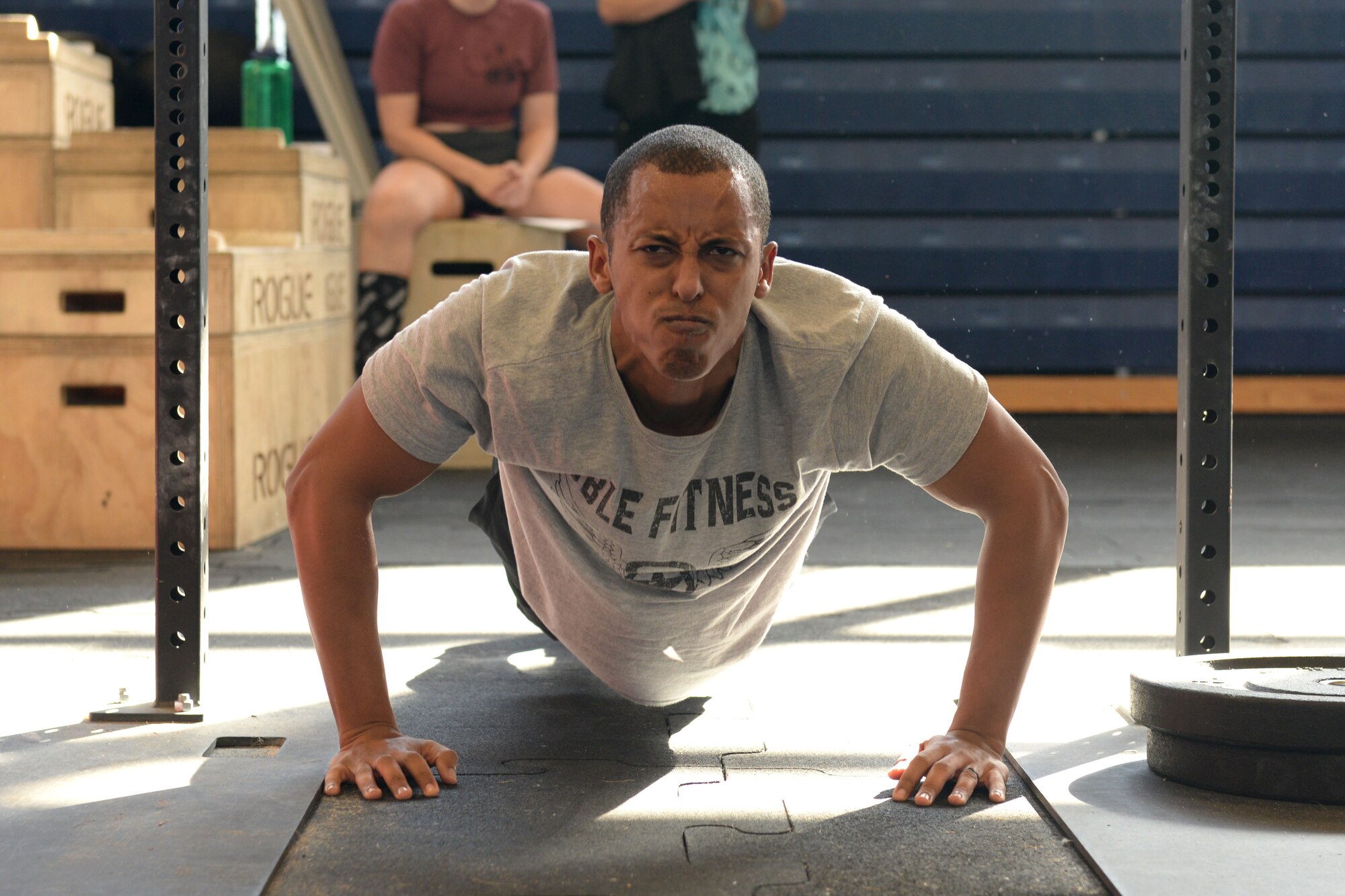 U.S. Air Force 1st Lt. Feysel Abdulkaf, 497th Operations Support Squadron chief of training, does push-ups in Fort Eustis' Anderson Field House at Joint Base Langley-Eustis, Va., Jan. 27, 2018.