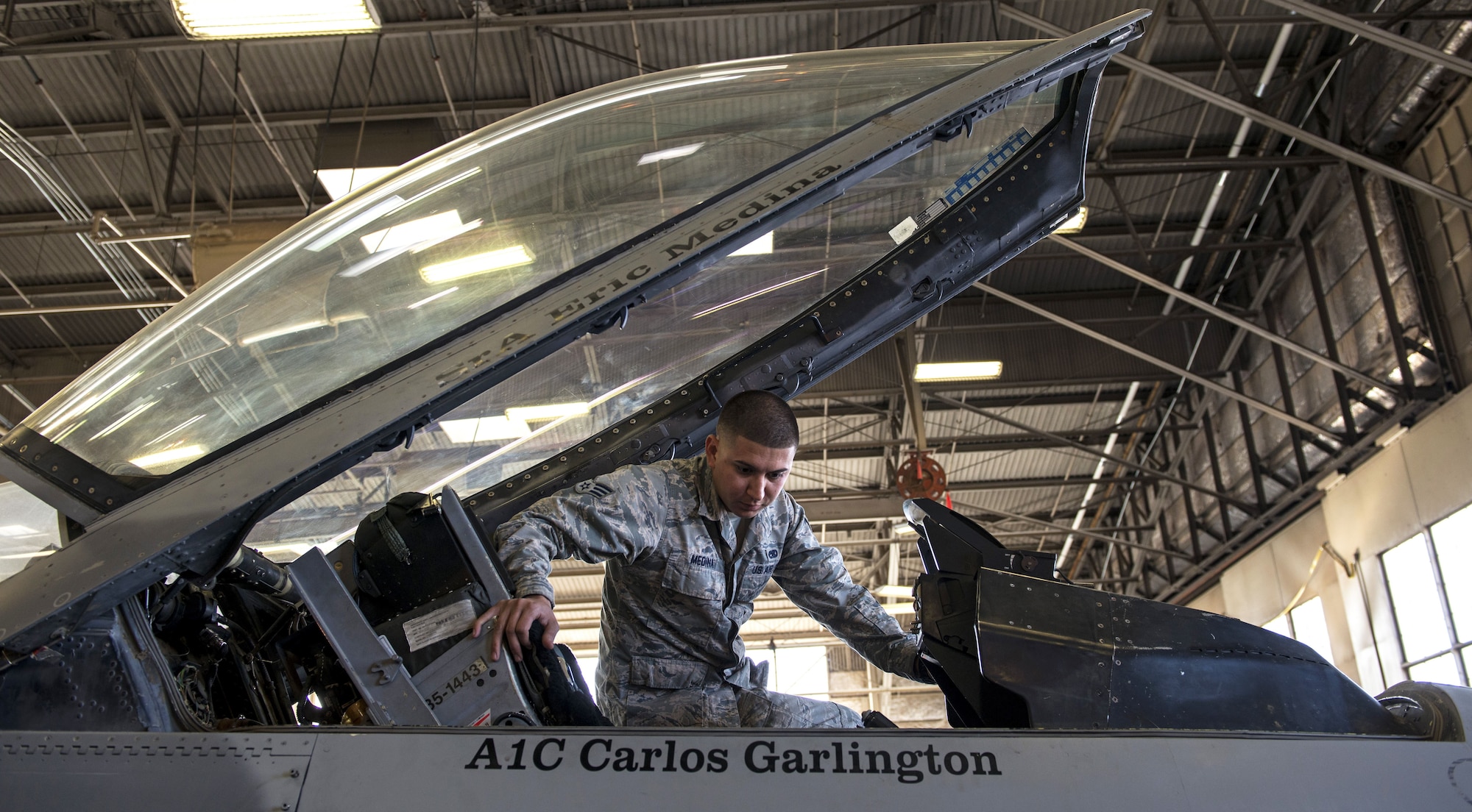 Senior Airman Eric Medina, 309th Aircraft Maintenance Unit dedicated crew chief, performs pre-flight inspections on an F-16 Fighting Falcon at Luke Air Force Base, Ariz., Jan. 25, 2018. DCCs are technical maintenance experts of their assigned aircraft and play a vital role in the success of Luke’s mission. (U.S. Air Force photo/Airman 1st Class Alexander Cook)