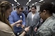 Participants of the Total Force Leadership Development Program work together to build a marshmallow and spaghetti tower during an icebreaking and teamwork exercise, Jan. 26, 2018, at Yokota Air Base, Japan.