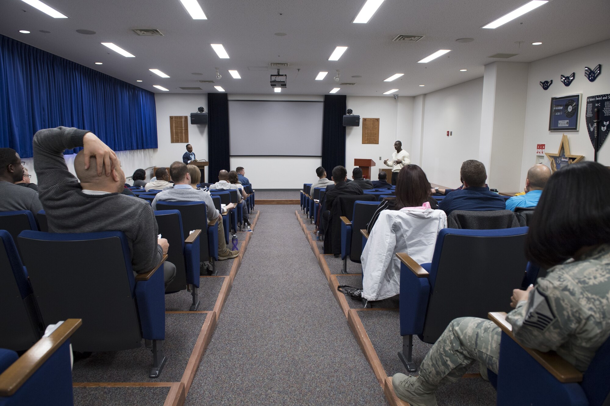 Senior Master Sgt. Sherlock Walker, 374th Communications Squadron operations superintendent and Total Force Leadership Development Program lead, (left), and Senior Master Sgt. Gabriel Lewis, 5th Air Force superintendent and Total Force Leadership Development Program lead facilitator, direct a group discussion, Jan. 29, 2018, at Yokota Air Base, Japan.