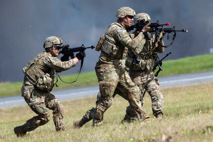 Paratroopers assigned to the 6th Brigade Engineer Battalion (Airborne), 4th Infantry Brigade Combat Team (Airborne), 25th Infantry Division, U.S. Army Alaska, bound toward their objective as part of the Joint Forces Demonstration during the Arctic Thunder Open House, July 1, 2018. This biennial event hosted by Joint Base Elmendorf-Richardson, Alaska, is one of the largest in the state and one of the premier aerial demonstrations in the world. The event features multiple performers and ground acts to include the JBER joint forces, U.S. Air Force F-22, and U.S. Air Force Thunderbirds demonstrations teams, June 30-July 1.