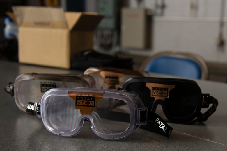 A variety of Fatal Vision goggles sit on the table during the 75th Safety Convention held at Misawa Air Base, Japan, May 24, 2018. Fatal Vision goggles are a line of training tools that simulate the effects of alcohol and drug intoxication without actually being under the influence. (U.S. Air Force photo by Airman 1st Class Collette Brooks)