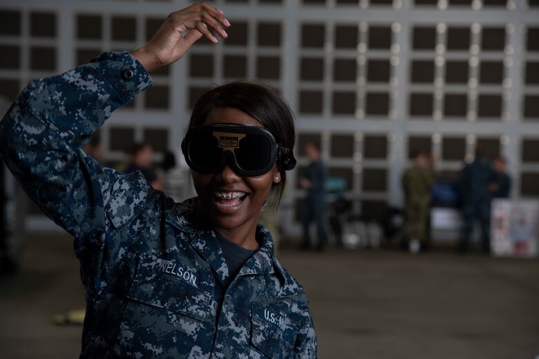 U.S. Navy Petty Officer 3rd Class Candice Nelson, a Naval Air Facility Misawa administrator, participates in the 75th Safety Convention at Misawa Air Base, Japan, May 24, 2018. The participants engaged in hands-on demonstrations which allowed them to experience the cognitive impairments of alcohol while maintaining a sober mind. (U.S. Air Force photo by Airman 1st Class Collette Brooks)