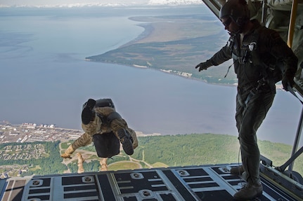 U.S. Air Force pararescuemen with the 212th Rescue Squadron jump from an HC-130J Combat King II during the joint forces demonstration at the Arctic Thunder Open House, July 1, 2018. This biennial event hosted by Joint Base Elmendorf-Richardson, Alaska, is one of the largest in the state and one of the premier aerial demonstrations in the world. The event features multiple performers and ground acts to include the JBER joint forces, U.S. Air Force F-22, and U.S. Air Force Thunderbirds demonstrations teams, June 30-July 1.