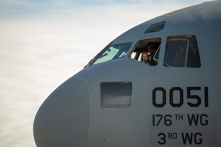 Arctic Thunder Open House attendees explore the flight deck of a C-17 Globemaster III, at Arctic Thunder Open House at Joint Base Elmendorf-Richardson, Alaska, July 1, 2018. During the biennial open house, JBER opens its gates to the public and hosts multiple performers including the U.S. Air Force Thunderbirds, JBER Joint Forces Demonstration and the U.S. Air Force F-22 Raptor Demonstration Team.