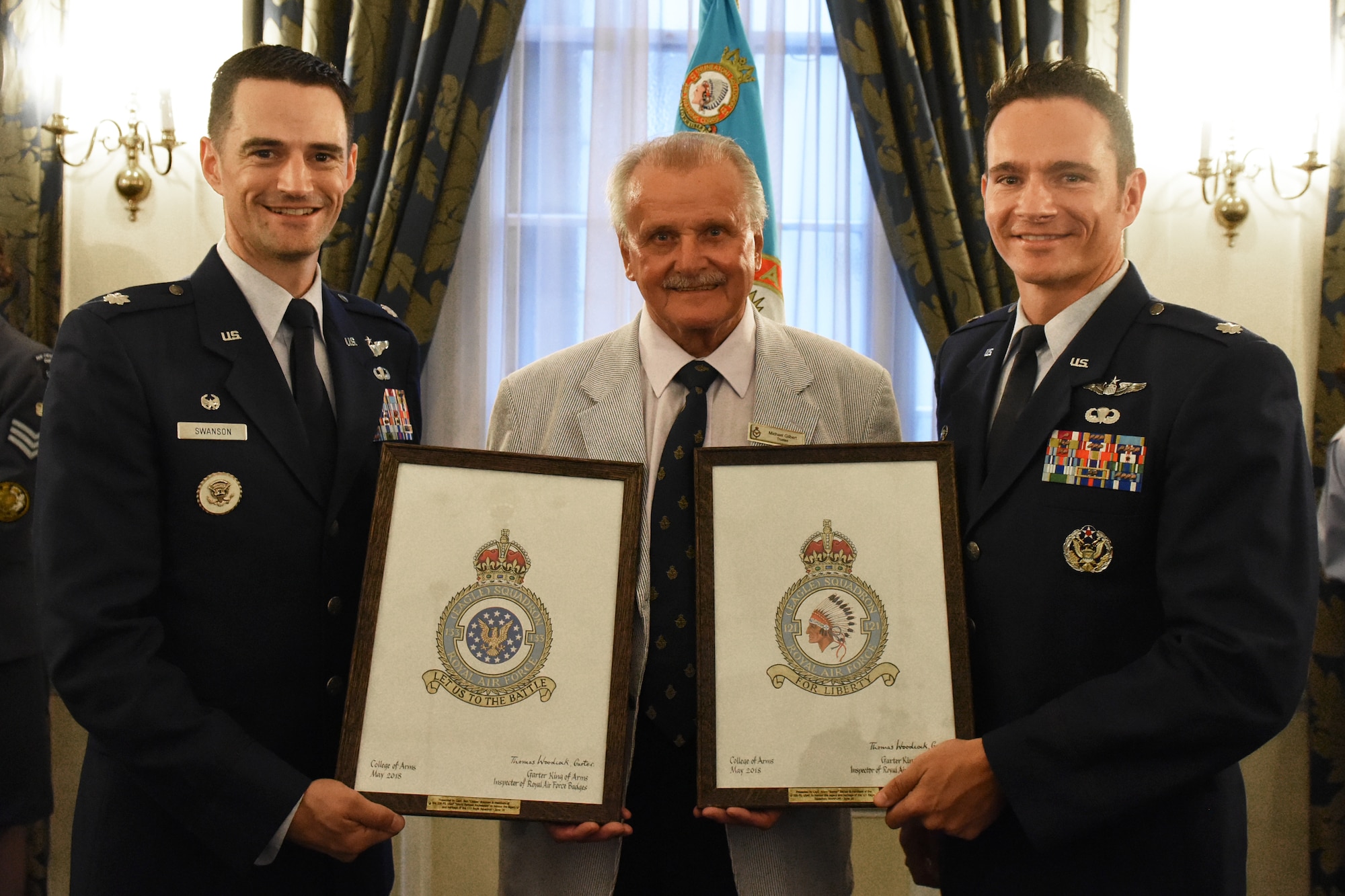 Lt. Col. Matthew Swanson, 336th Fighter Squadron commander at Seymour-Johnson Air Force Base, Goldsboro, North Carolina, and Lt. Col. Isaac Bell, 335th FS commander at Seymour-Johnson AFB, for a photo during the eagle squadron ceremony at Royal Air Force Club in London, England, June 29. The RAF 121 and 133 Eagle squadron badges, worn by the pilots in the original eagle squadrons, will now be displayed at the RAF Club in their honor. (U.S. Air Force photo/Airman 1st Class Christopher S. Sparks)