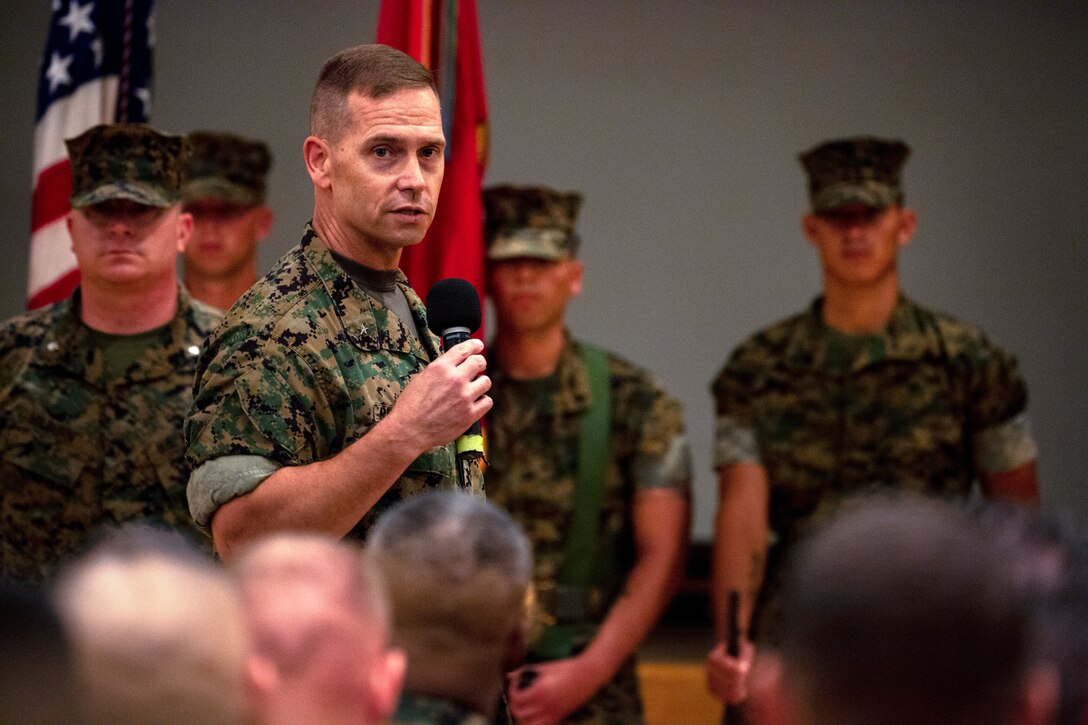 Brig. Gen. Keith D. Reventlow, commanding general of 3rd Marine Logistics Group, addresses the audience during the regimental change of command ceremony July 2, 2018 at Camp Kinser, Okinawa, Japan. Lt. Col. Kenric D. Stevenson assumed command of Combat Logistics Regiment 35 in May 2018 and was succeeded by Col. Joon H. Um. Reventlow is a native of Newtown, Connecticut. Stevenson is a native of DeRidder, Louisiana. Um is a native of Tampa, Florida. (U.S. Marine Corps photo by Cpl. Joshua S. Pinkney)