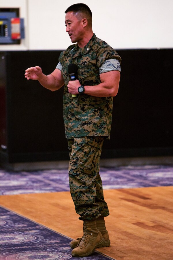 Col. Joon H. Um, incoming commanding officer of Combat Logistics Regiment 35, 3rd Marine Logistics Group addresses the audience during the regimental change of command ceremony July 2, 2018 at Camp Kinser, Okinawa, Japan. Lt. Col. Kenric D. Stevenson assumed command of CLR-35 in May 2018 and was succeeded by Um. Stevenson is a native of DeRidder, Louisiana. Um is a native of Tampa, Florida. (U.S. Marine Corps photo by Lance Cpl. Armando M. Elizalde)